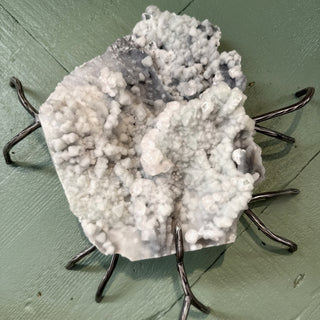 Detail view of Sugar Calcite Specimen Statement Piece  on custom artisan stand at Mind's Eye Mystics