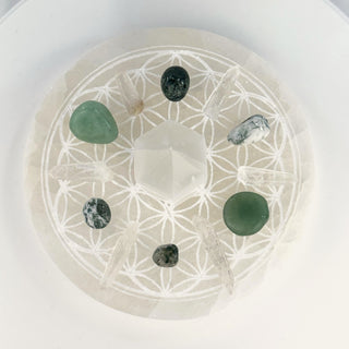 Crystal Grid Set for Abundance, top view, Flower of Life selenite plate with tree agate, moss agate, green aventurine and Lemurian quartz points