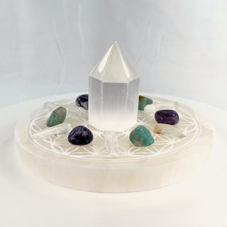 Crystal Grid Set for Calm, side view, selenite tower centered on the Flower of Life plate with lepidolite, amazonite and Lemurian quartz points