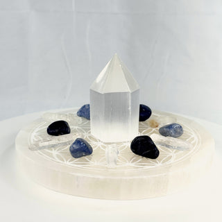Crystal Grid Set for Clarity, side view, selenite tower centered on the Flower of Life plate with sodalite, blue aventurine and Lemurian quartz points