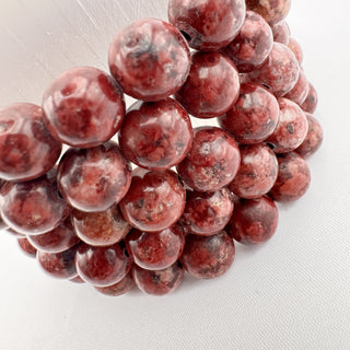 Detail view of Eudialyte Bracelet 8mm Jewelry - Bracelet at Mind's Eye Mystics
