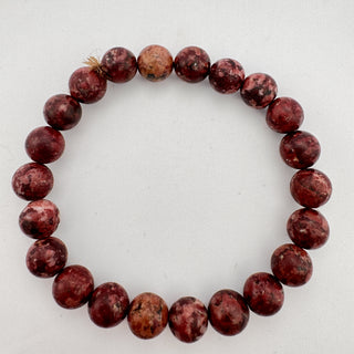 Detail view of Eudialyte Bracelet 8mm Jewelry - Bracelet at Mind's Eye Mystics