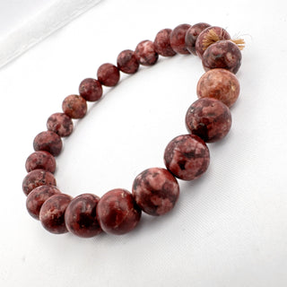 Detail view of Eudialyte Bracelet 8mm Jewelry - Bracelet at Mind's Eye Mystics