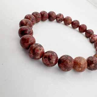 Detail view of Eudialyte Bracelet 8mm Jewelry - Bracelet at Mind's Eye Mystics