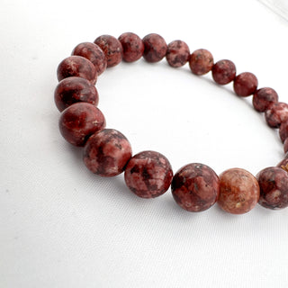 Detail view of Eudialyte Bracelet 8mm Jewelry - Bracelet at Mind's Eye Mystics