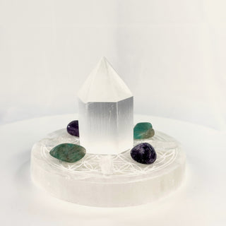 Mini Crystal Grid Set for Calm, side view, selenite tower centered on the Flower of Life plate with lepidolite, amazonite and Lemurian quartz points