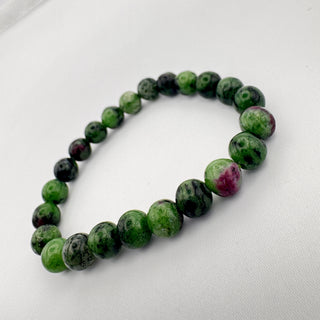 Detail view of Ruby Zoisite Bracelet 8mm Jewelry - Bracelet at Mind's Eye Mystics