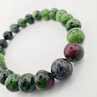 Detail view of Ruby Zoisite Bracelet 8mm Jewelry - Bracelet at Mind's Eye Mystics